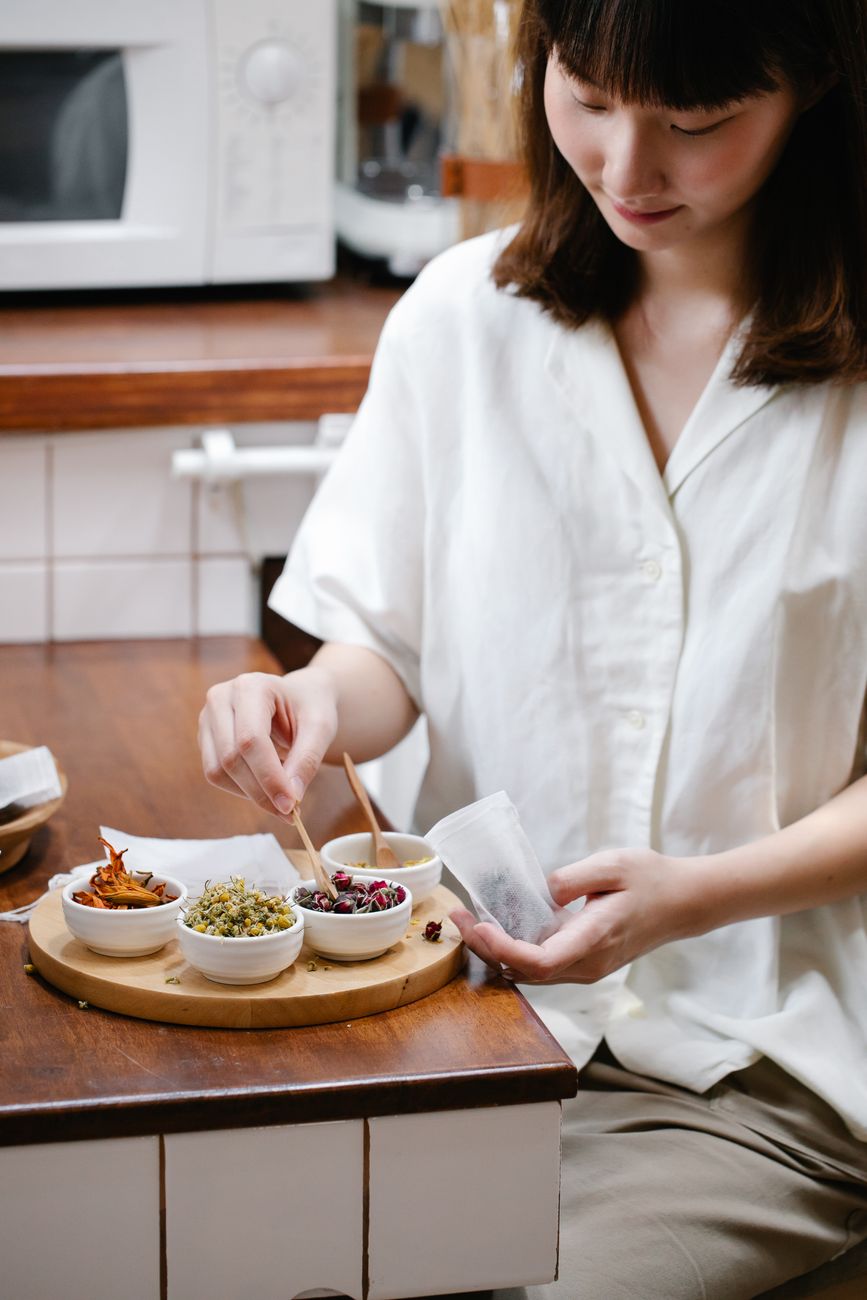 Person preparing food at a kitchen counter